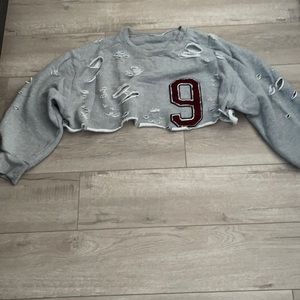 Gray oversized cropped razored cut letterman sweatshirt